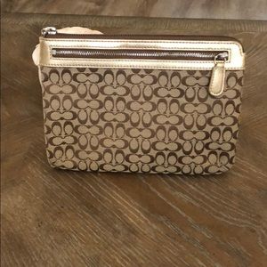 Medium size Coach bag tan in color